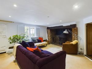 Cottage sitting room with inglenook- click for photo gallery